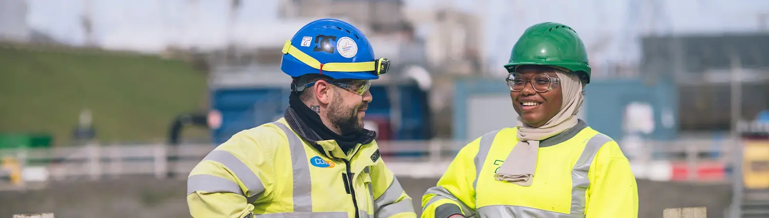 Employees in hi vis on a construction site