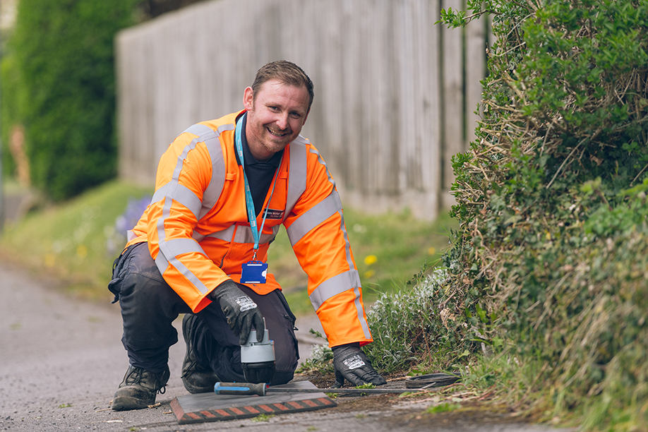 Man installing a smart water meter