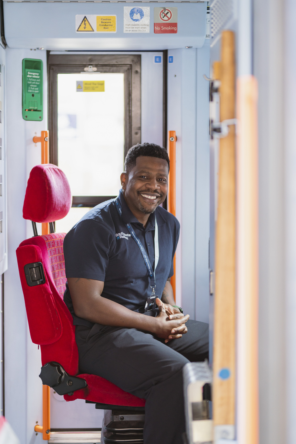 Person, Sitting, Adult, Male, Man, Face, Head, Smile, Bag, Handbag