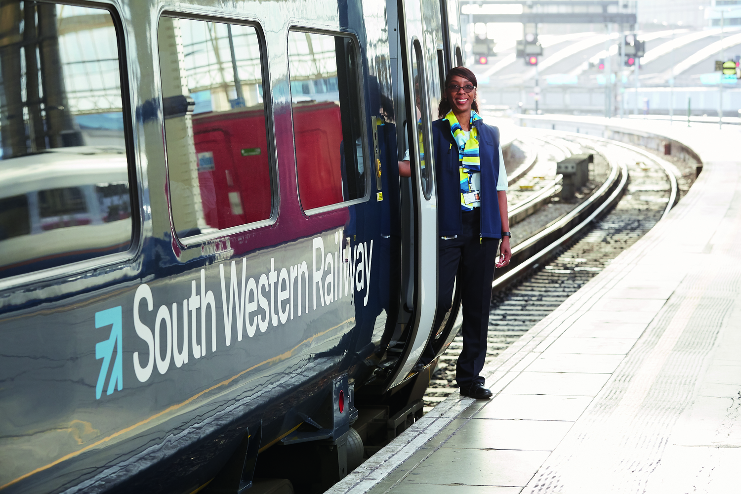 Terminal, Train, Train Station, Glasses, Adult, Male, Man, Person, Shoe, Wristwatch