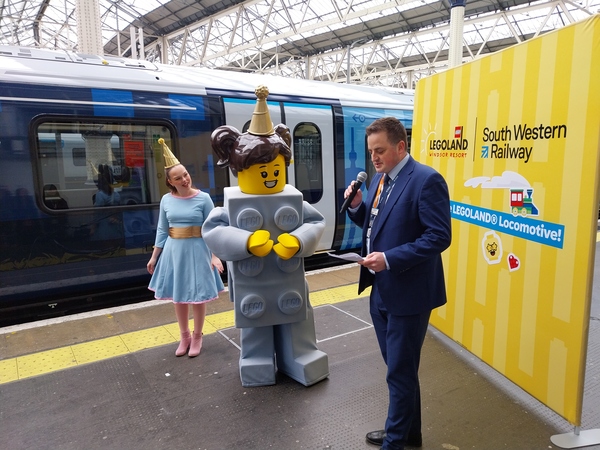 Microphone, Shoe, Adult, Male, Man, Person, Female, Woman, Terminal, Train Station