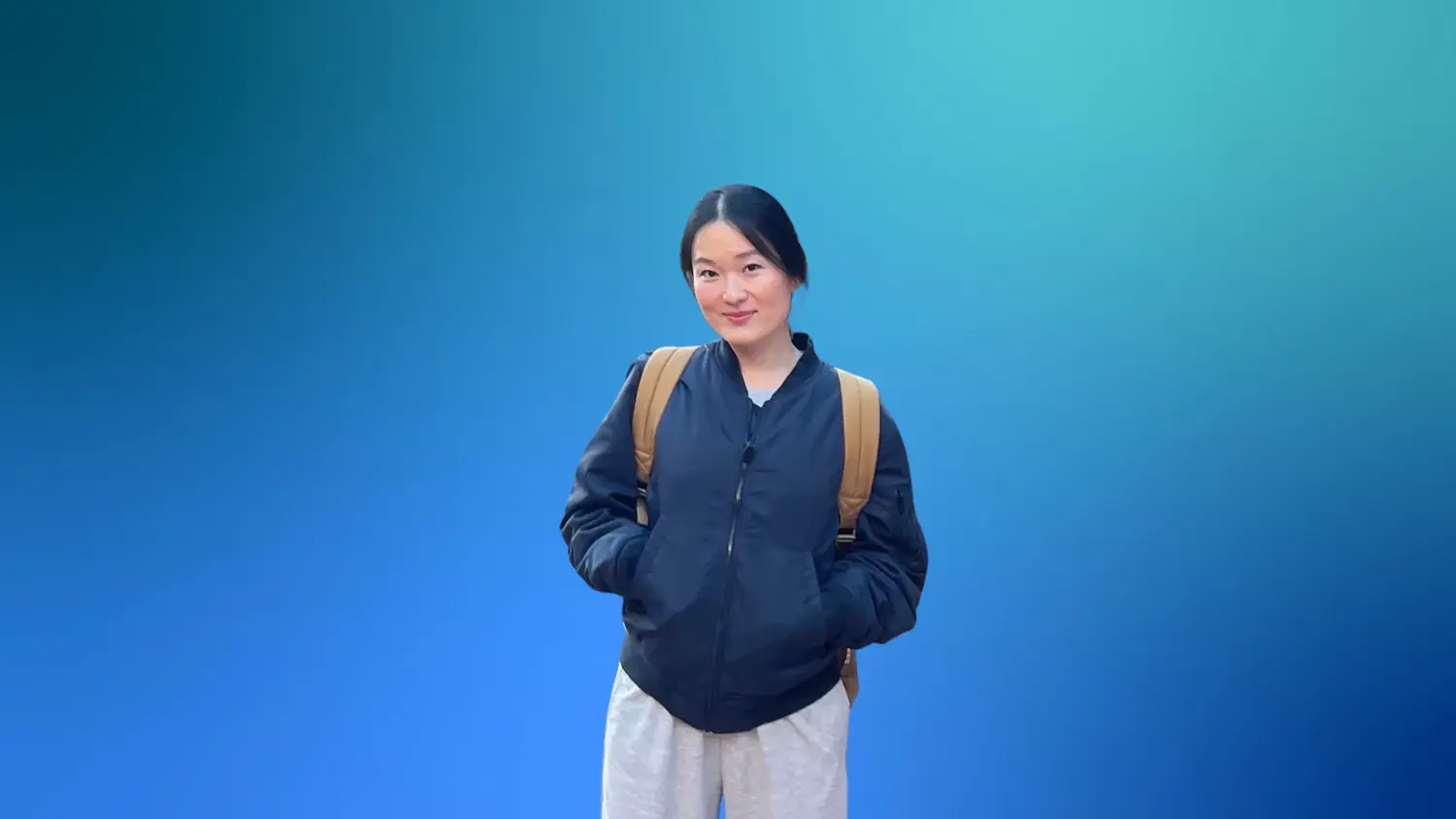 Face, Head, Person, Smile, Adult, Female, Woman, Jacket, Standing, Bag