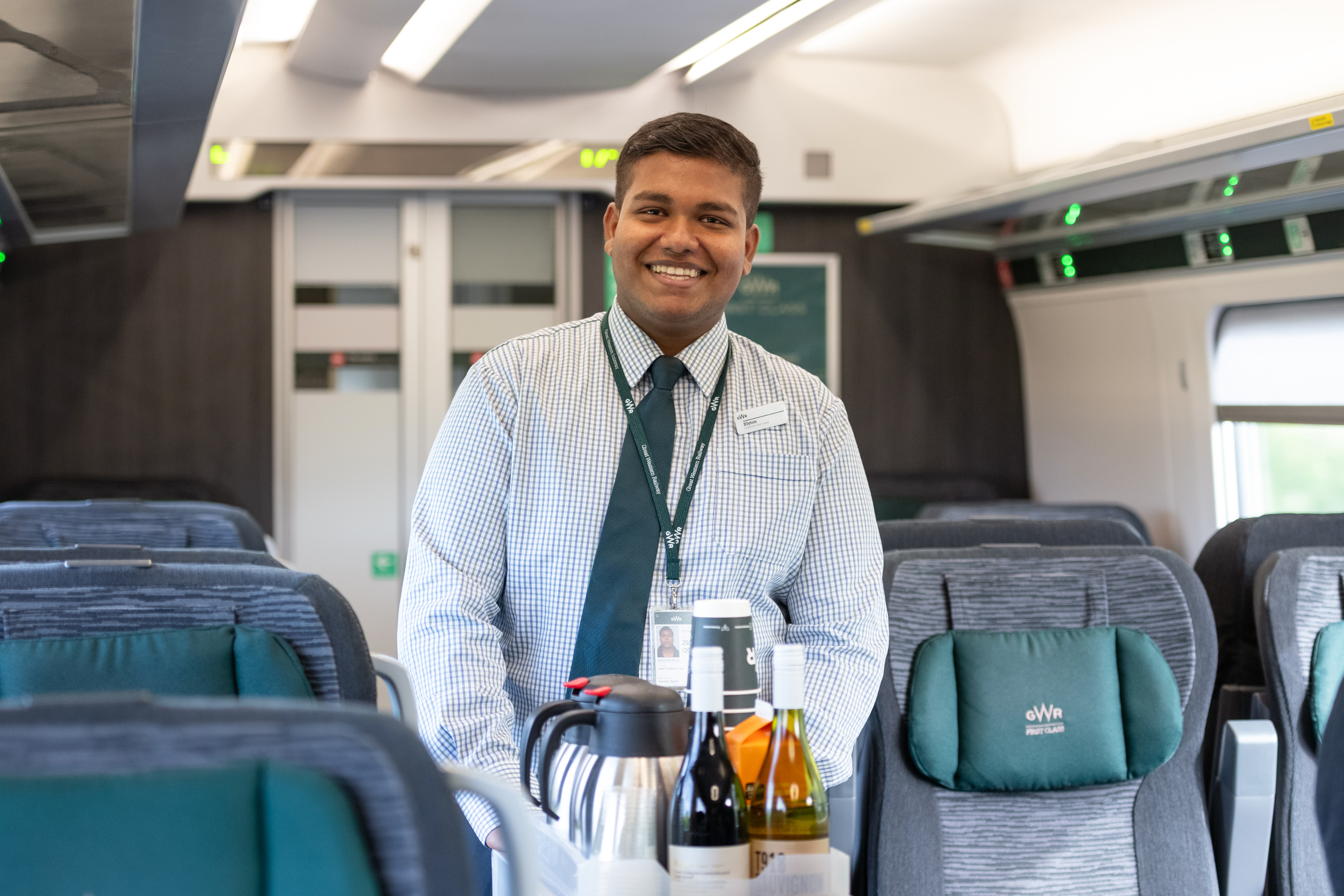 Adult, Male, Man, Person, Formal Wear, Tie, Chair, Cushion, Vehicle, Face