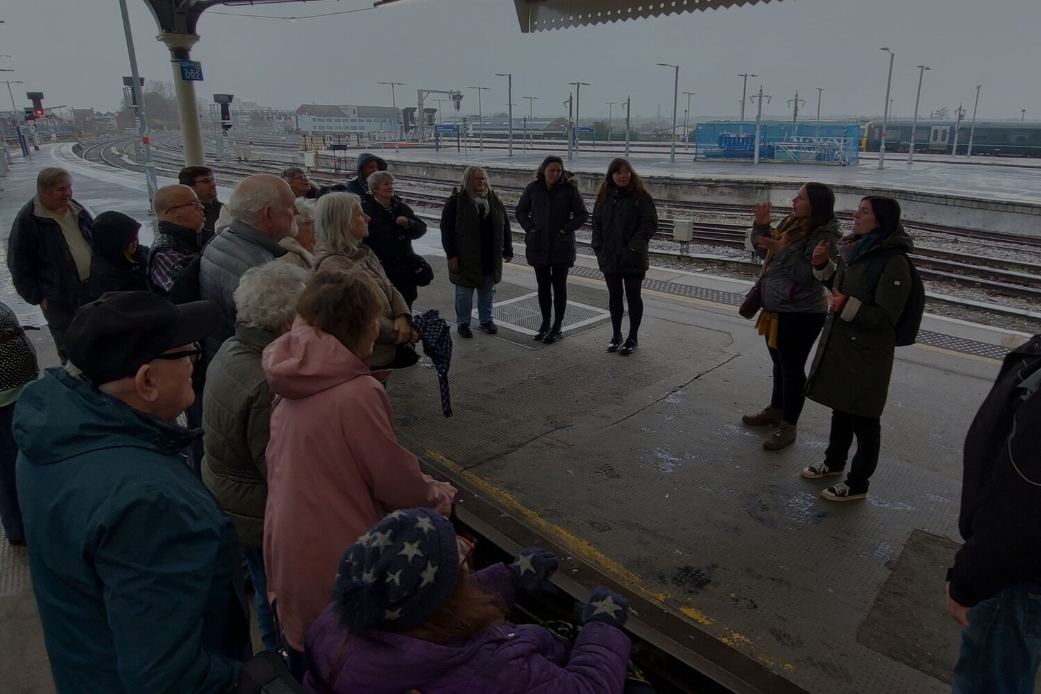 Coat, Glove, Adult, Female, Person, Woman, Terminal, Male, Man, Shoe