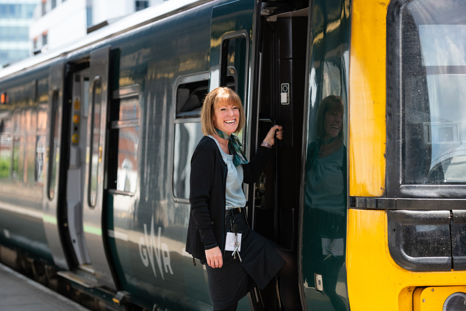 Face, Head, Person, Smile, Adult, Female, Woman, Train, Belt, Wristwatch
