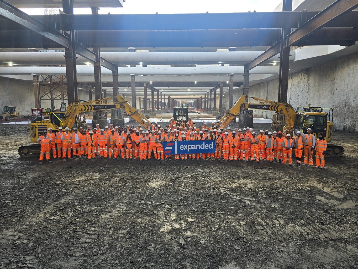 Person, Worker, People, Groupshot, Helmet, Footwear, Shoe, Bulldozer, Factory, Manufacturing