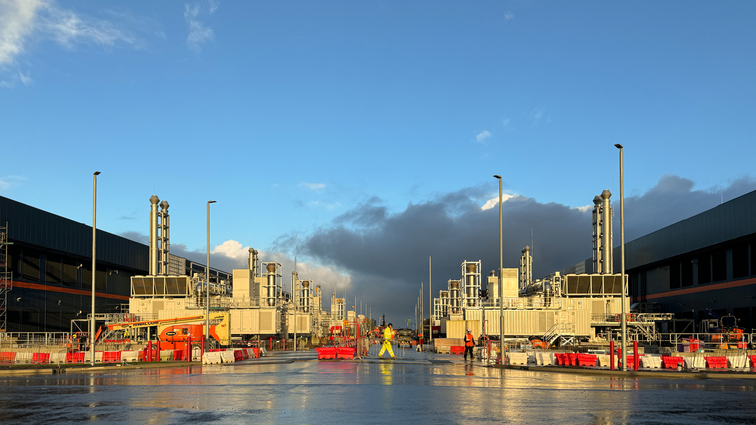 Water, Waterfront, Port, Factory, Barge, Watercraft, Person, Handbag, Refinery, Traffic Light