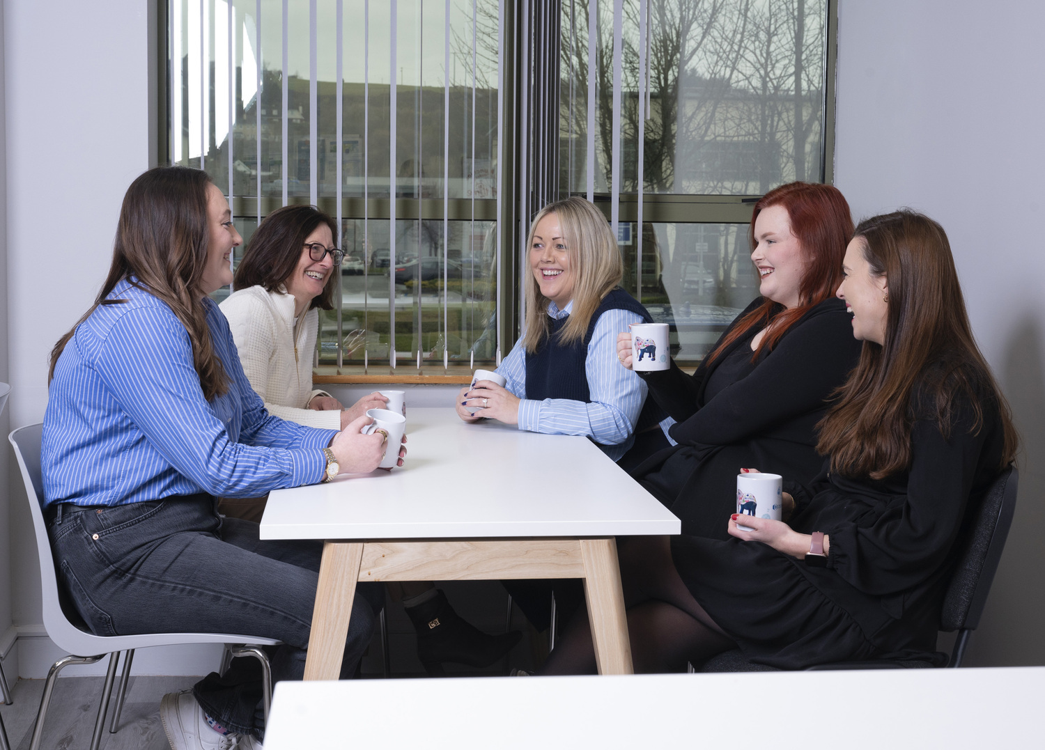 Adult, Female, Person, Woman, Conversation, Cup, Chair, Wristwatch, Shoe, Glasses