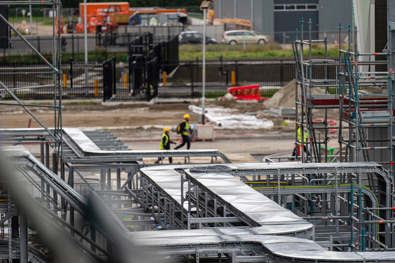 Helmet, Person, Worker, Construction, Clothing, Hardhat, Car, Vehicle, Glove, Wheel