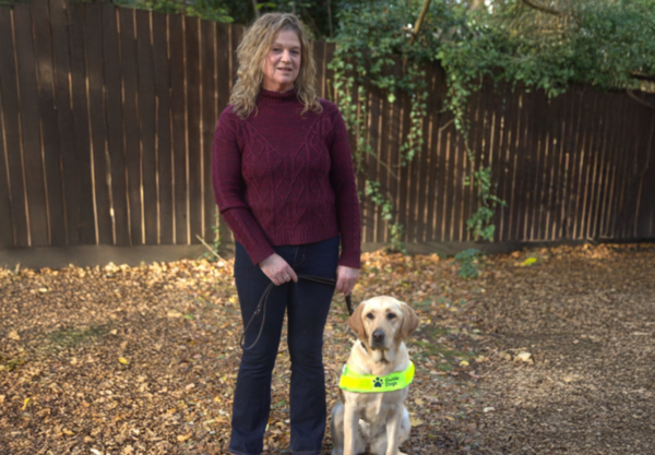 Knitwear, Sweater, Adult, Female, Person, Woman, Canine, Dog, Pants, Jeans