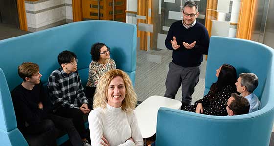 People, Person, Conversation, Head, Face, Clothing, Knitwear, Sweater