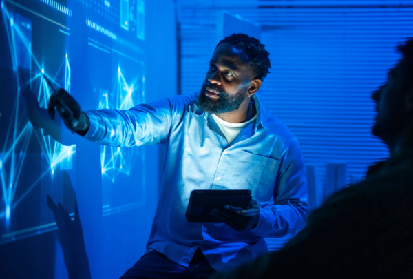 Glove, Adult, Male, Man, Person, Face, Head, Smile, Light, Mobile Phone