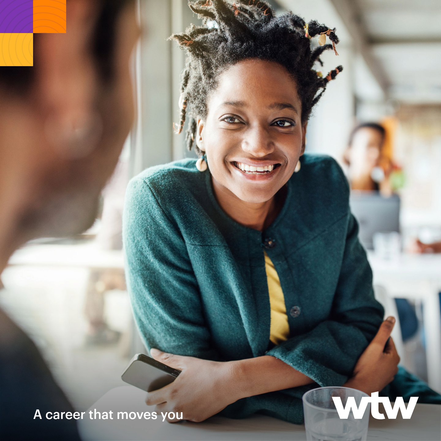black woman speaking with colleague