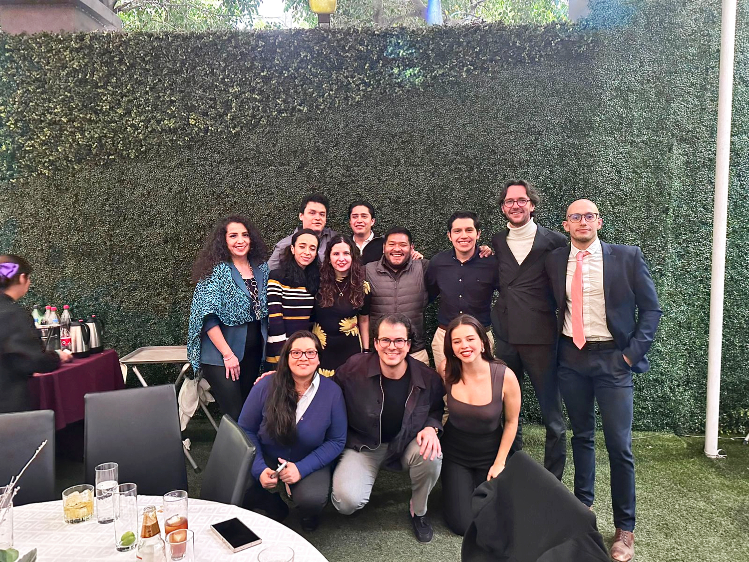 People, Person, Adult, Female, Woman, Groupshot, Blazer, Male, Man, Table