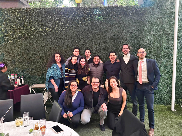 People, Person, Adult, Female, Woman, Groupshot, Blazer, Male, Man, Table