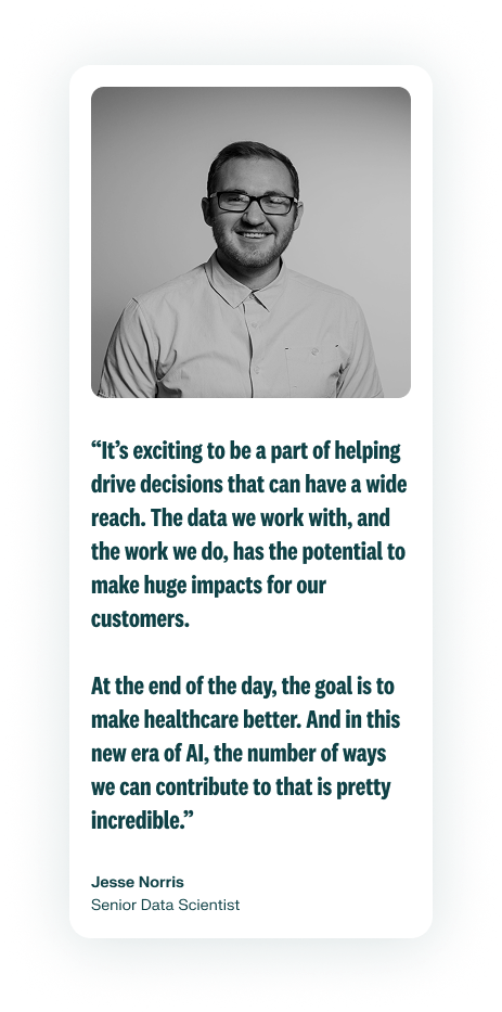 A photo of an employee smiling and wearing glasses. Their photo is b&w. Their quote describes AI and Analytics.