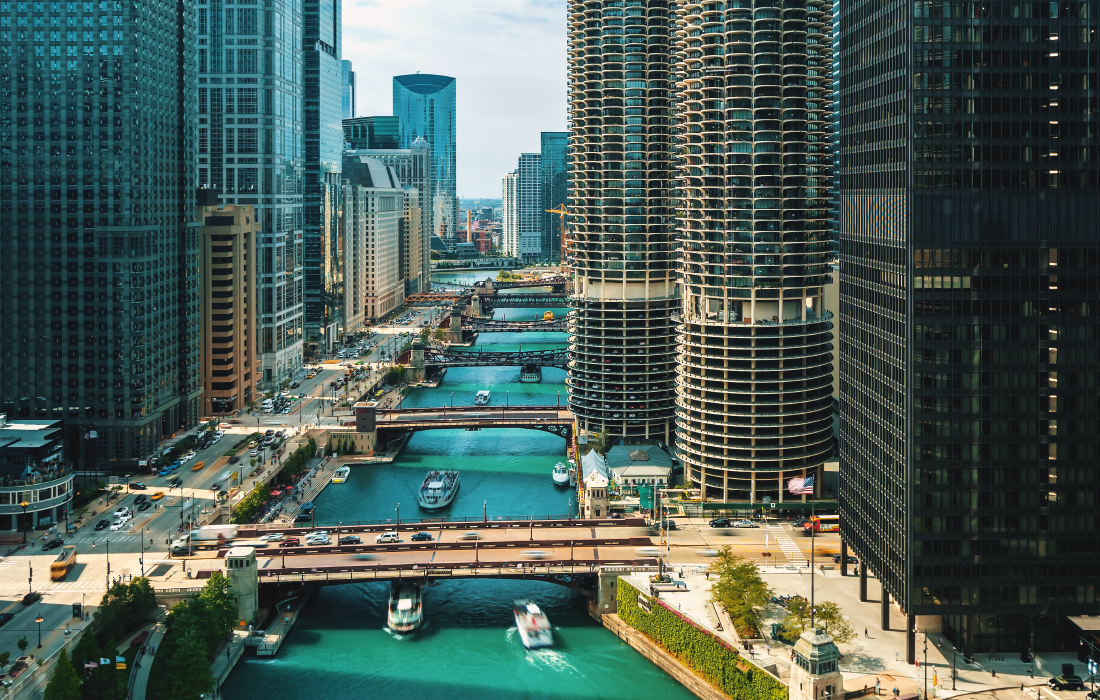 Aqua colored blue chicago river with bridges crossing over and buildings on either side. There is a electric teal and light green neon oval over the photo.