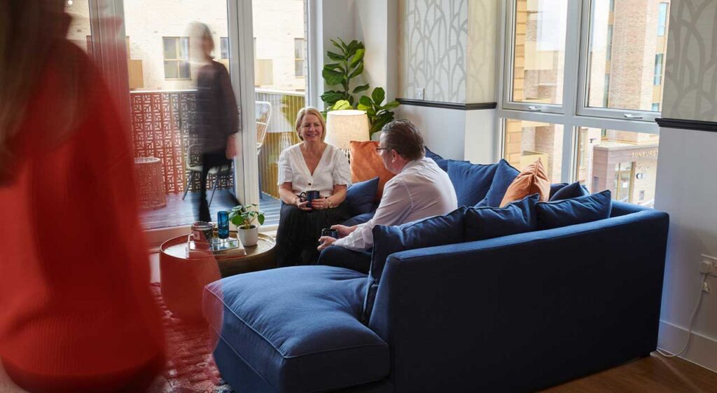 Couch, Furniture, Adult, Female, Person, Woman, Plant, Male, Man, Cup