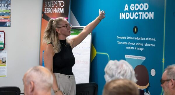 Hannah, Business Admin Apprentice at Wates Construction giving a talk