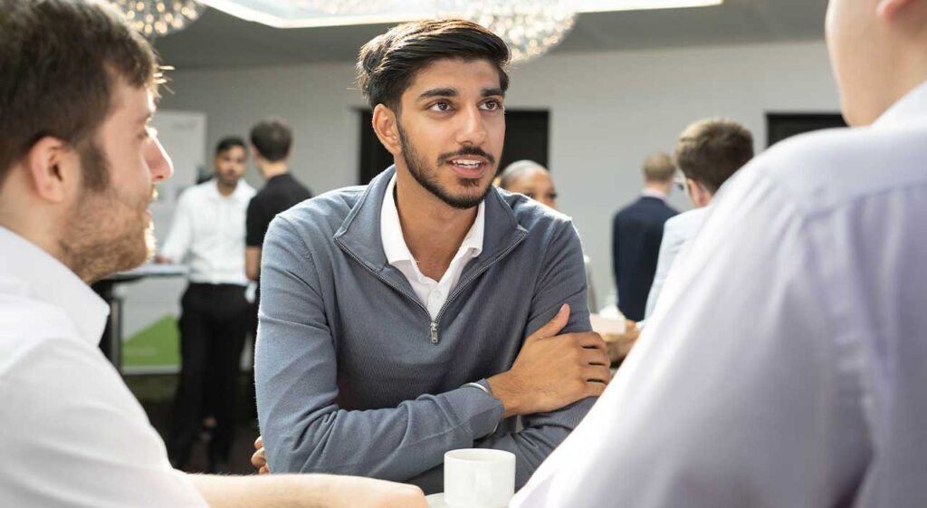 Conversation, Person, Adult, Male, Man, Clothing, Formal Wear, Suit, Head, Face