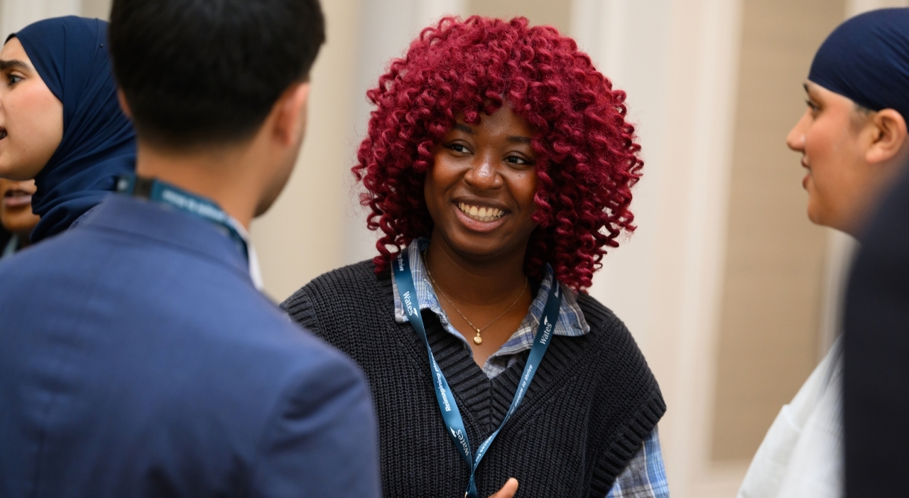 trainee with curly red hair